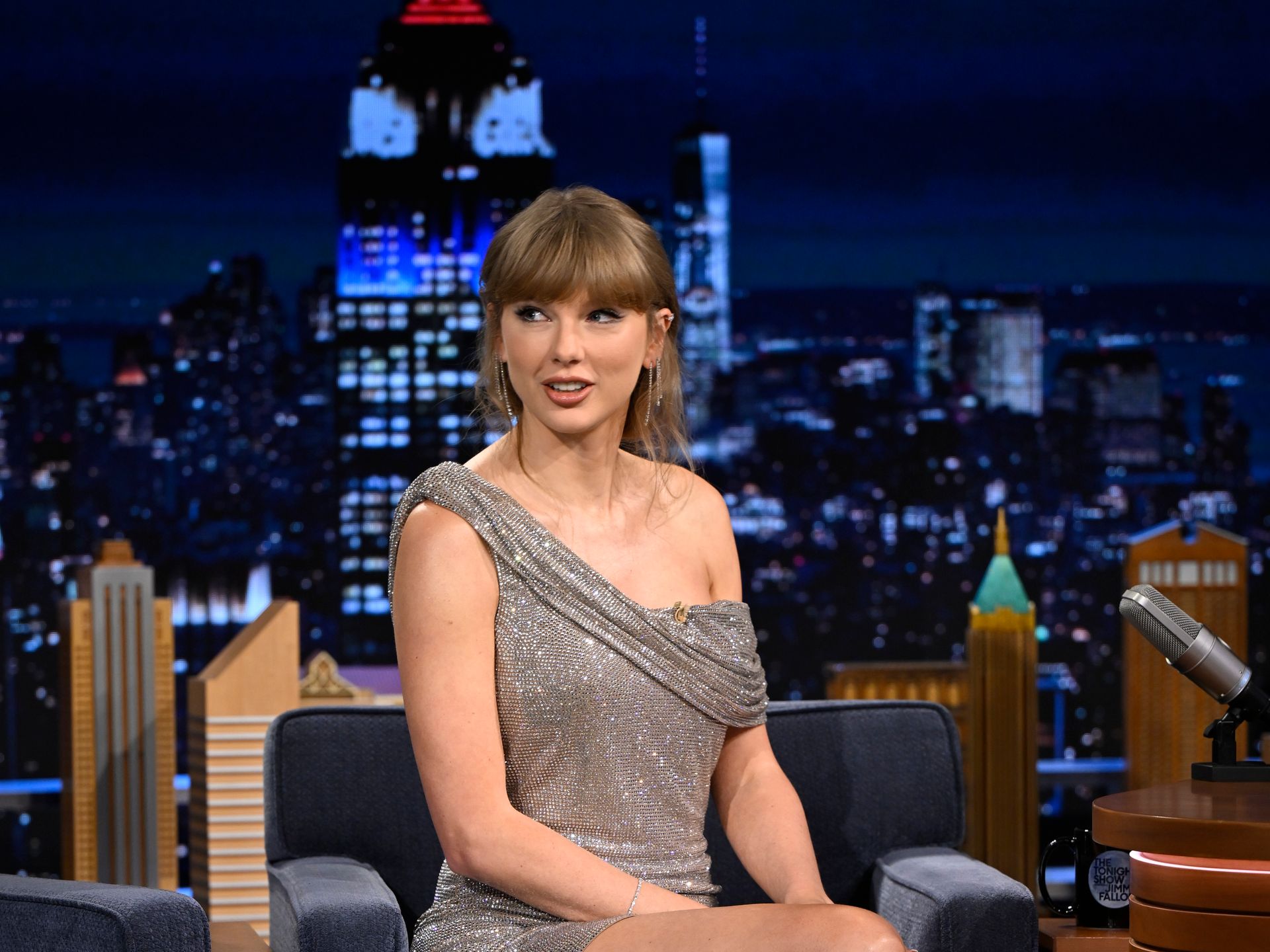 Taylor Swift showcases her ultra long legs in silver mini dress in head-turning appearance on The Tonight Show | HELLO!