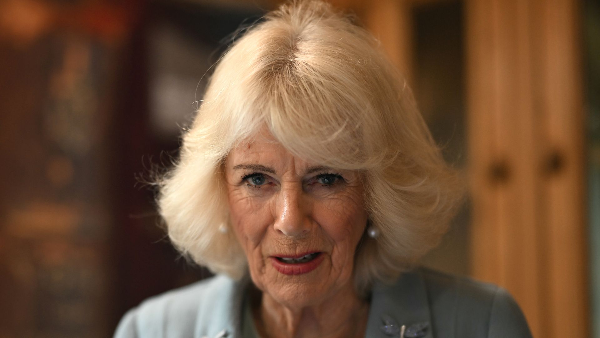 Britain's Queen Camilla tours the rooms during a visit to the cottage in Thornton where the Bronte children were born during a visit to Bradford to celebrate the city's year as UK City of Culture on May 15, 2025 in Bradford, England.