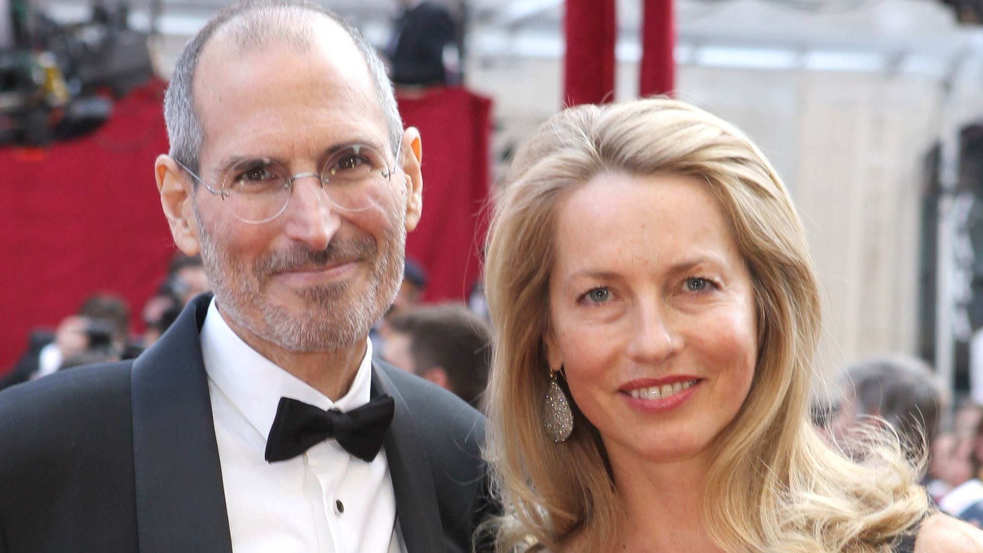 steve jobs and laurene powell jobs in black tie