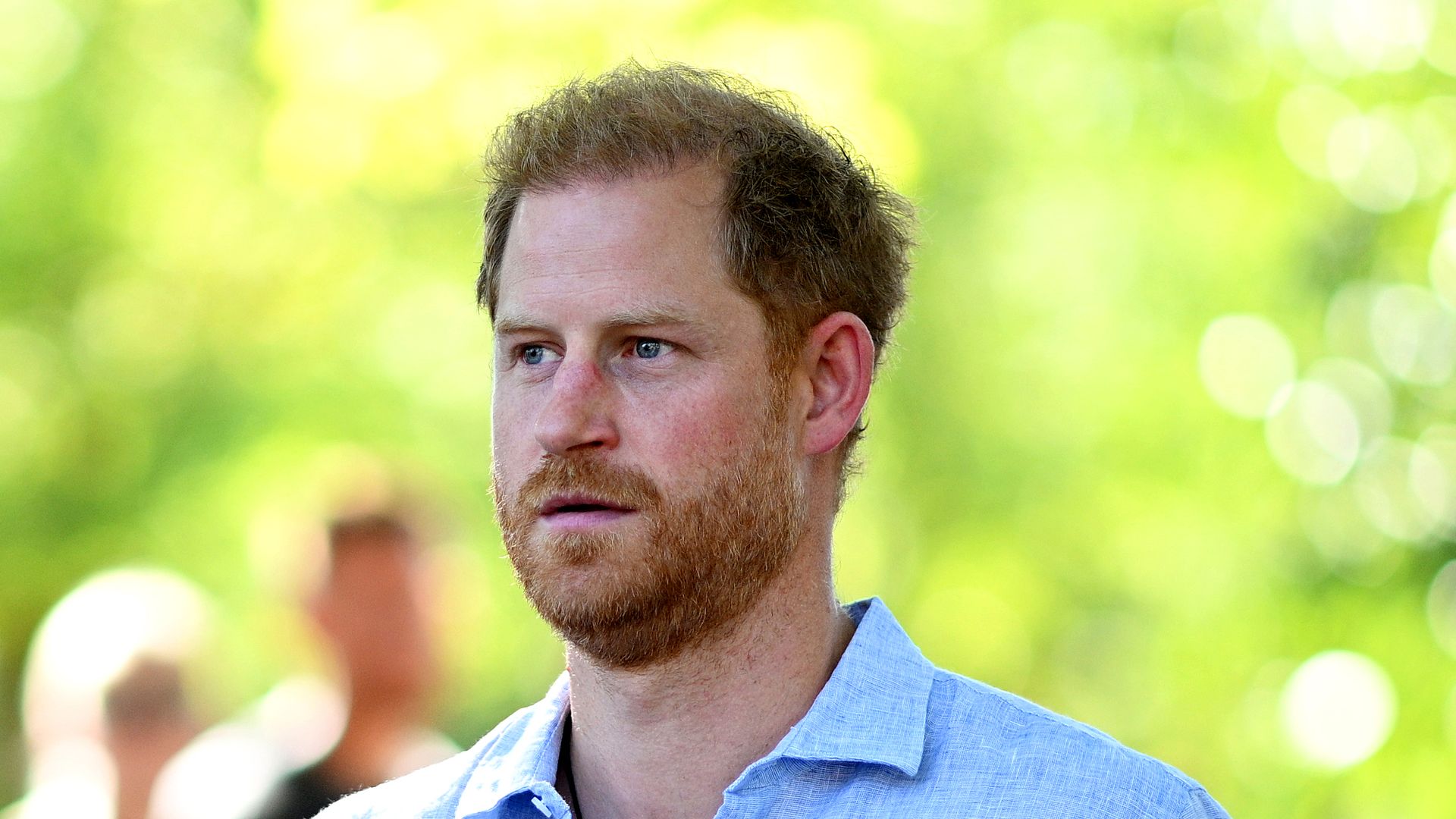 Prince Harry in Dusseldorf with trees in background