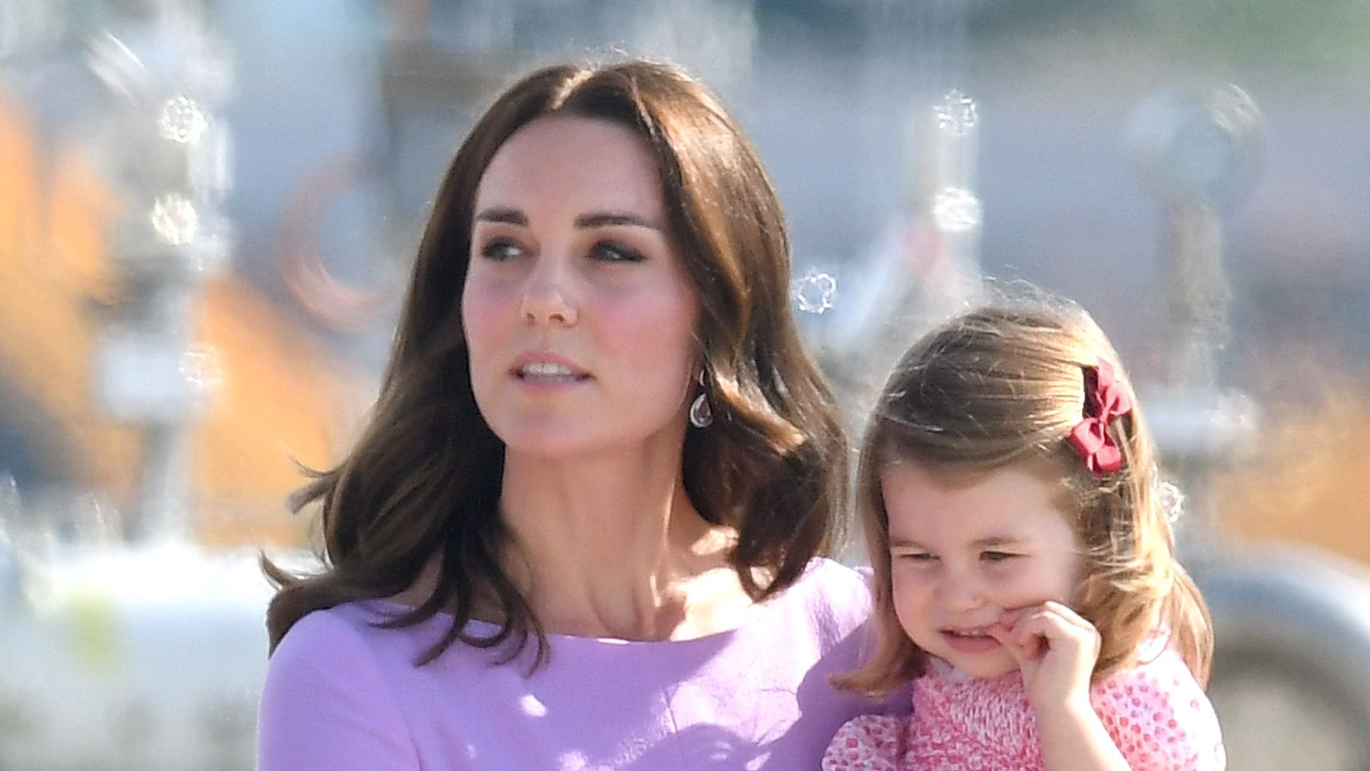 Princess kate holding two-year-old charlotte