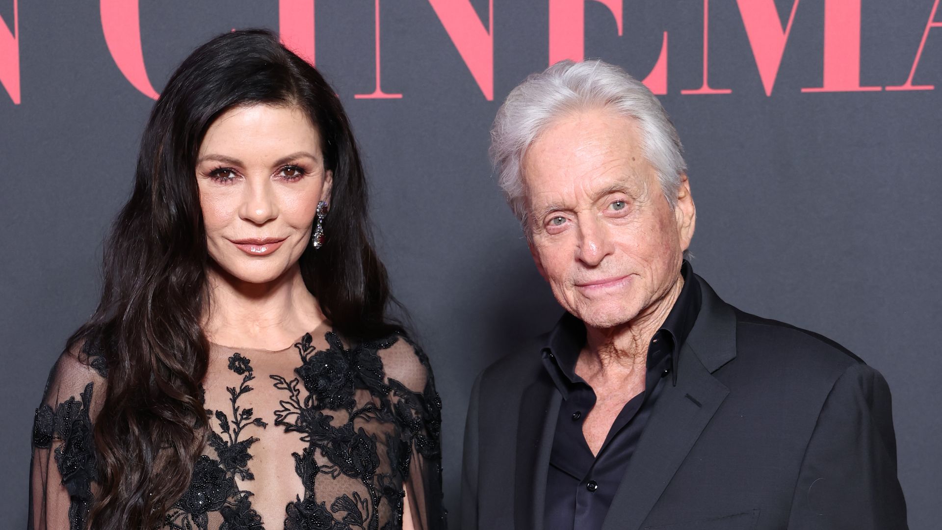 Michael and Catherine look smart in lace gown and suit in red carpet photo