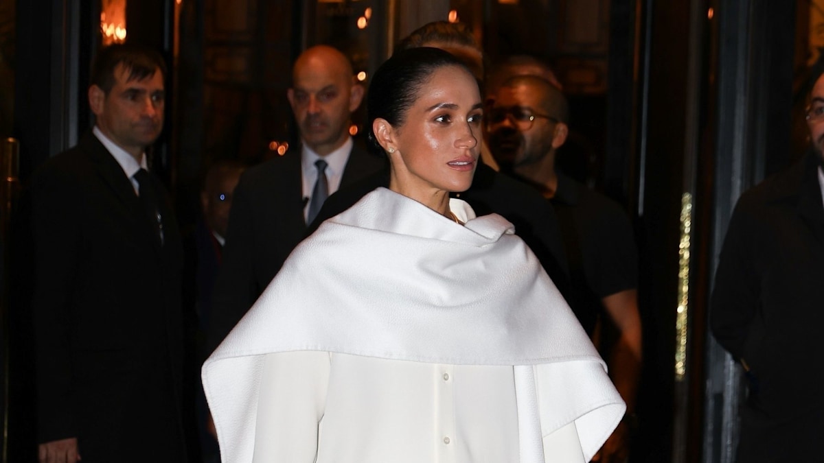 Exclusive: Meghan Markle attends Balenciaga show during Paris Fashion Week