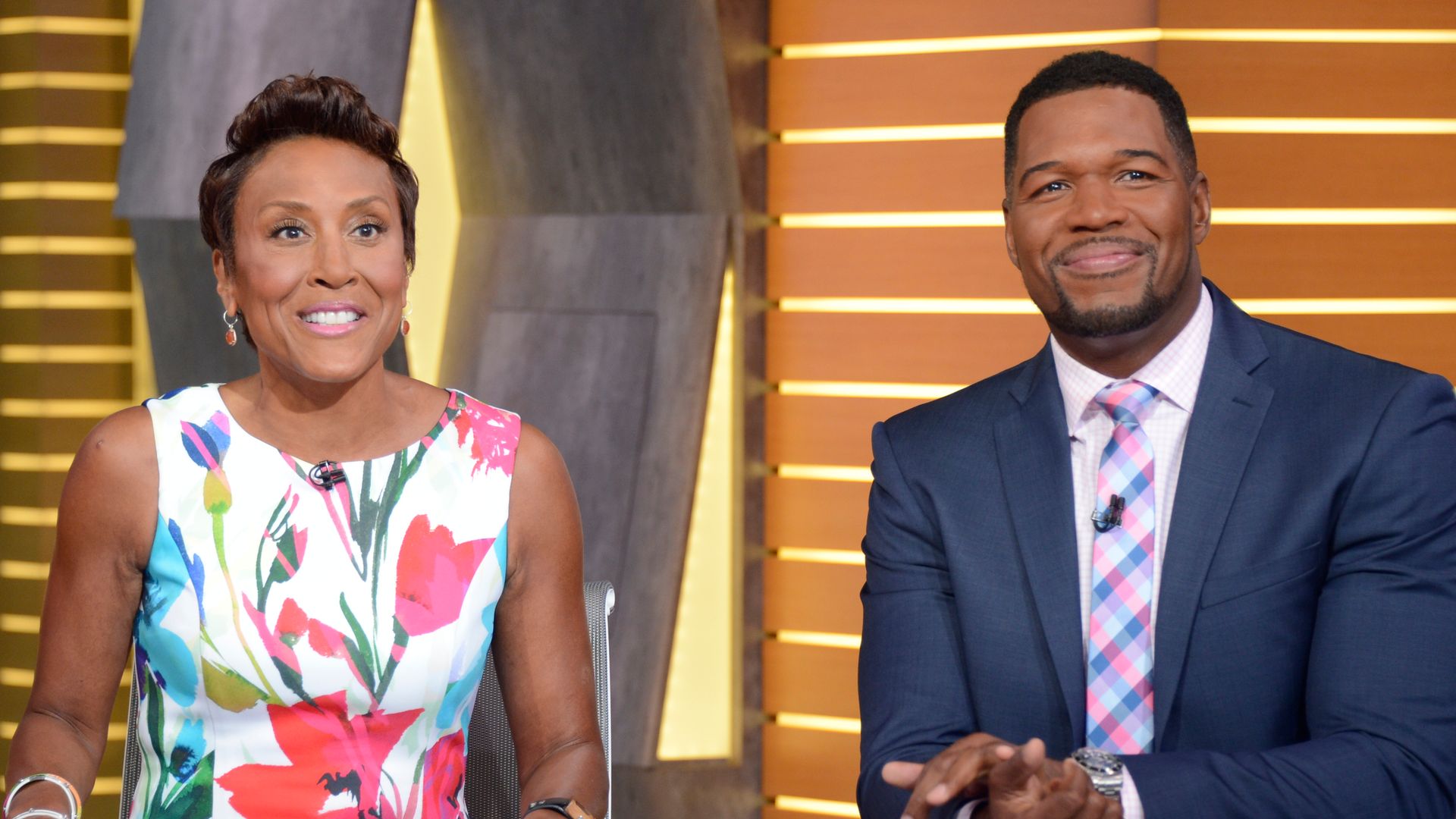 photo of michael strahan and robin roberts sitting at gma desk