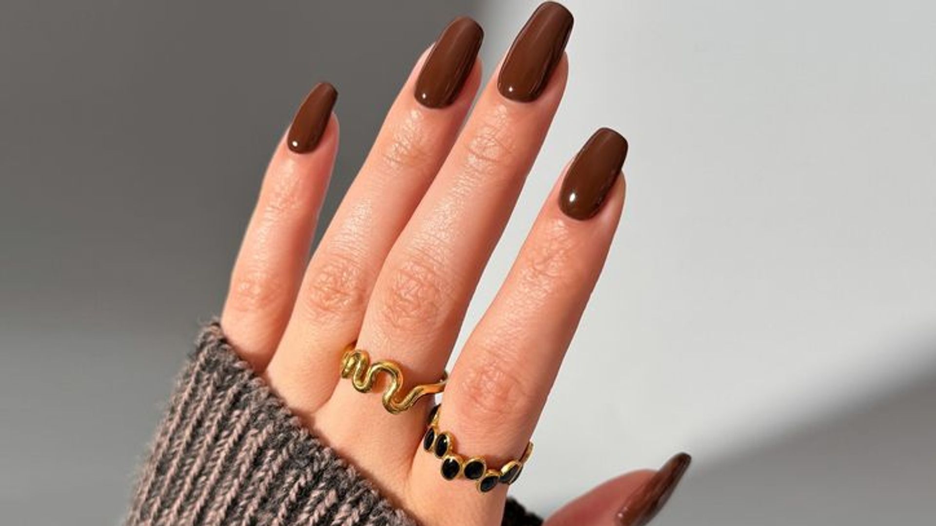 dark brown earth tone nails manicure