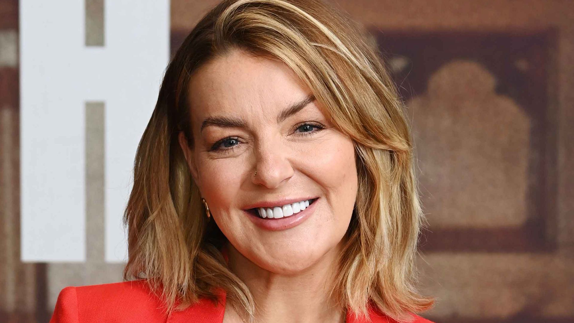 Woman in red suit
