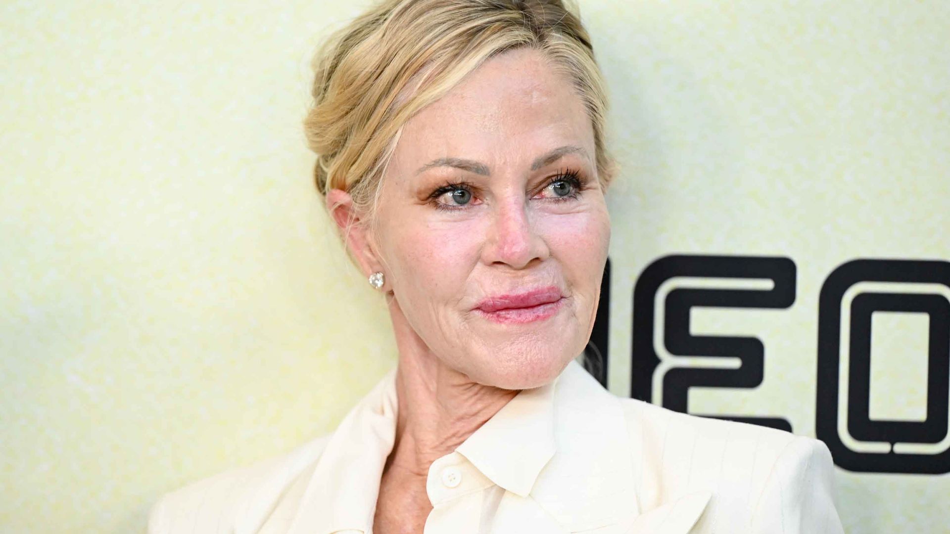 Melanie griffith in white suit