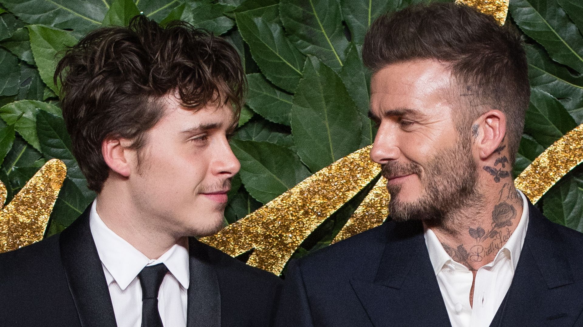 LONDON, ENGLAND - DECEMBER 10: Brooklyn Beckham and David Beckham arrive at The Fashion Awards 2018 In Partnership With Swarovski at Royal Albert Hall on December 10, 2018 in London, England. (Photo by Samir Hussein/Samir Hussein/WireImage)