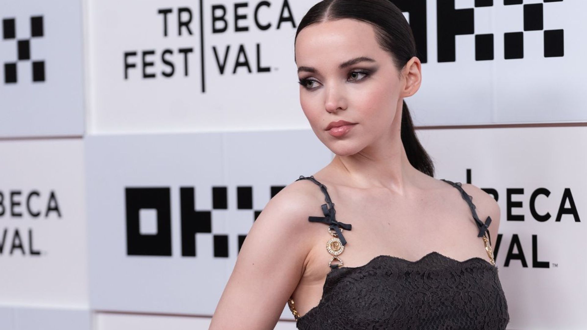 Dove Cameron wears show-stopping grey lace gown for Tribeca