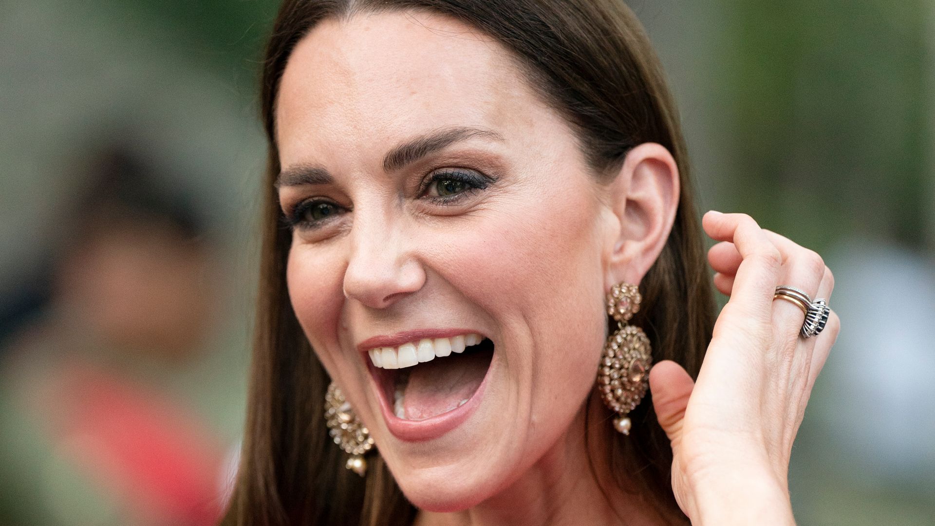 Princess Kate once banished iconic curls in favour of poker straight hair – see 'sporadic' reason