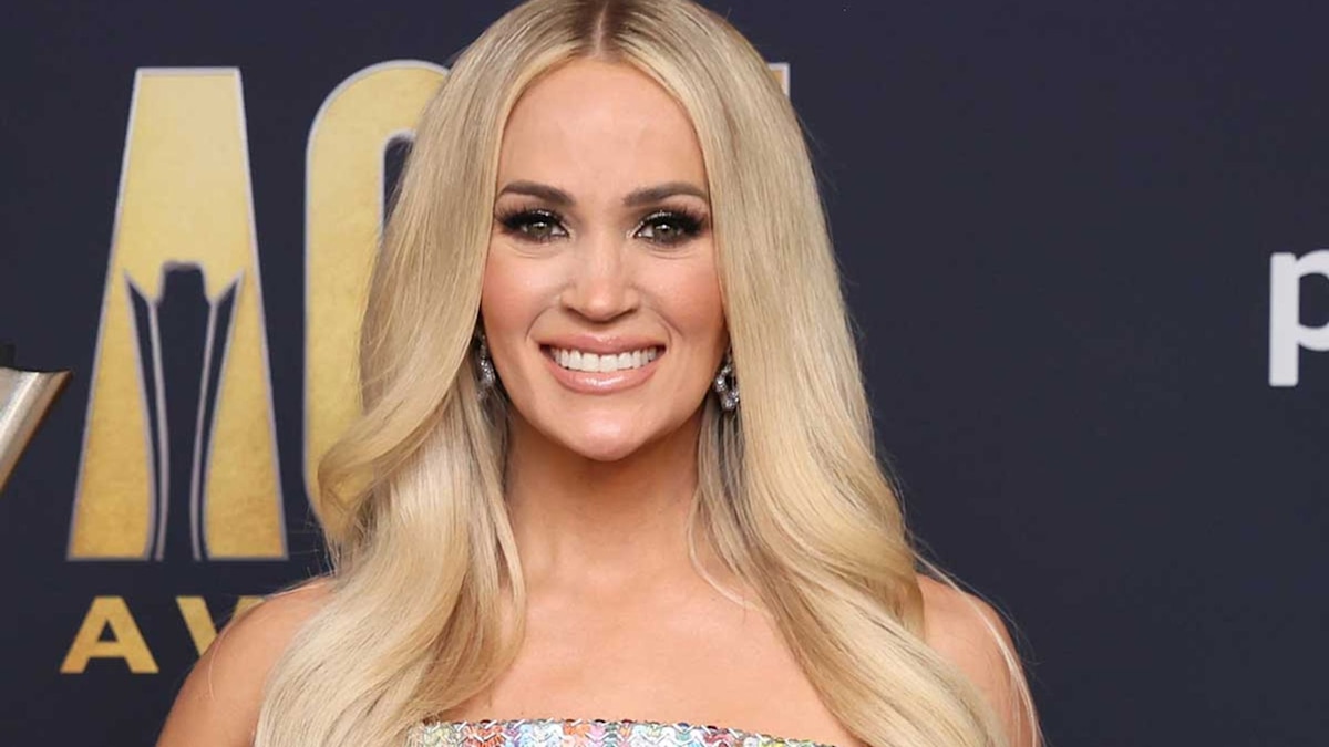 Carrie Underwood dazzles fans in jaw-dropping jeweled dress for exciting countdown | HELLO!