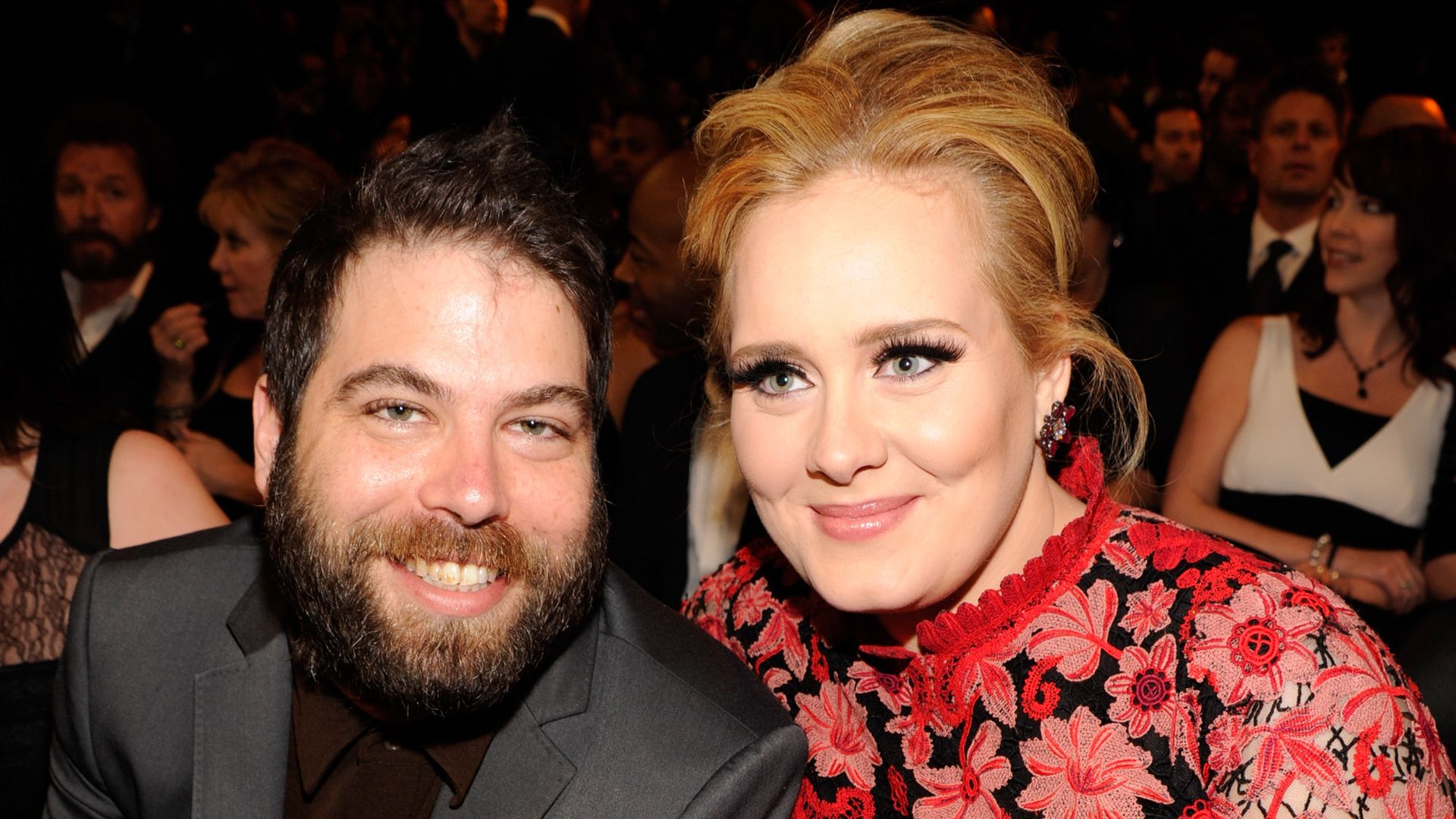 Adele and Simon Konecki smile for photo while sitting watching the Grammys in February 2013