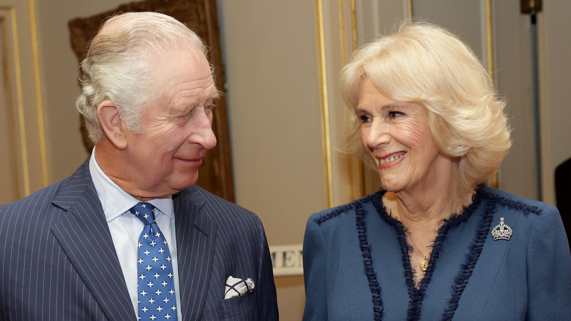 LONDON, ENGLAND - FEBRUARY 23: King Charles III and Camilla, Queen Consort laugh during a reception to celebrate the second anniversary of The Reading Room at Clarence House on February 23, 2023 in London, England. The Reading Room, which was official launched by the Queen Consort 2 years ago, champions literacy and encourages readers to find new literature. (Photo by Chris Jackson/Getty Images)