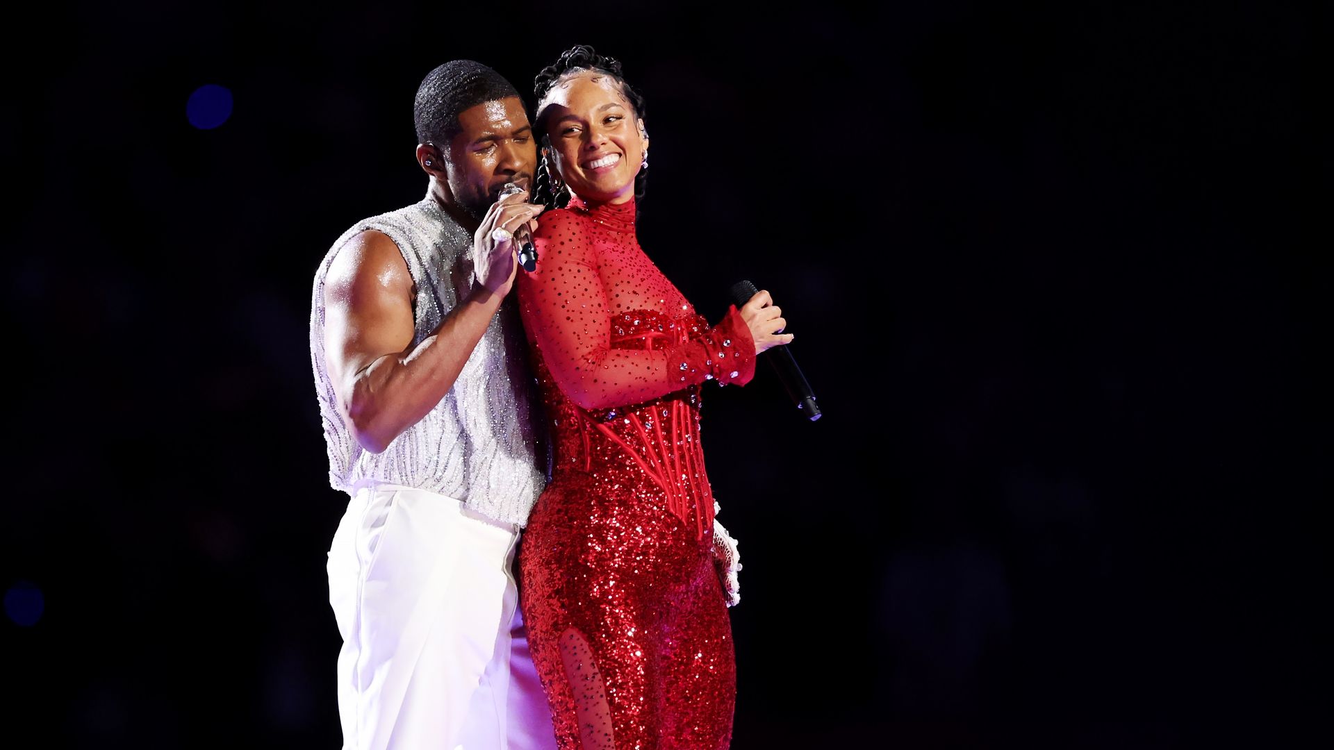 Usher and Alicia Keys perform onstage during the Apple Music Super Bowl LVIII Halftime Show at Allegiant Stadium on February 11, 2024 in Las Vegas, Nevada.