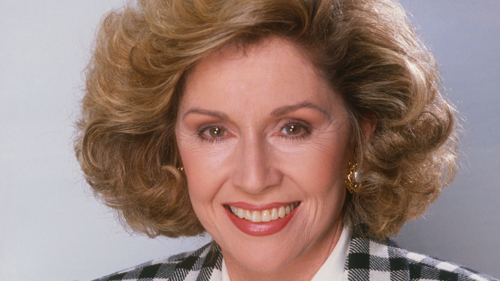 Patricia Crowley smiling in a headshot from 1989. 
