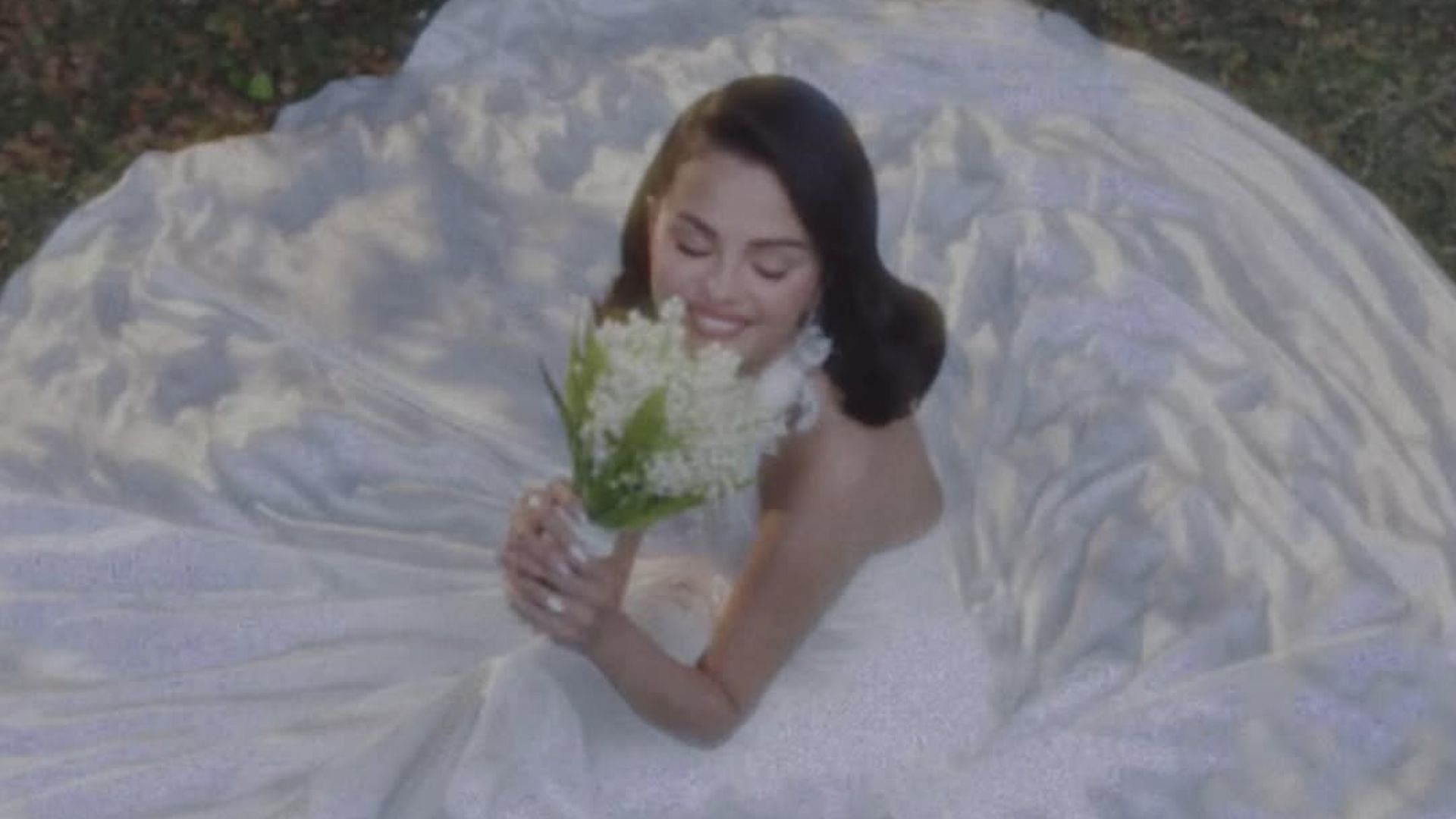 Selena Gomez poses for a photo in her Ralph Lauren wedding gown, shared on Instagram