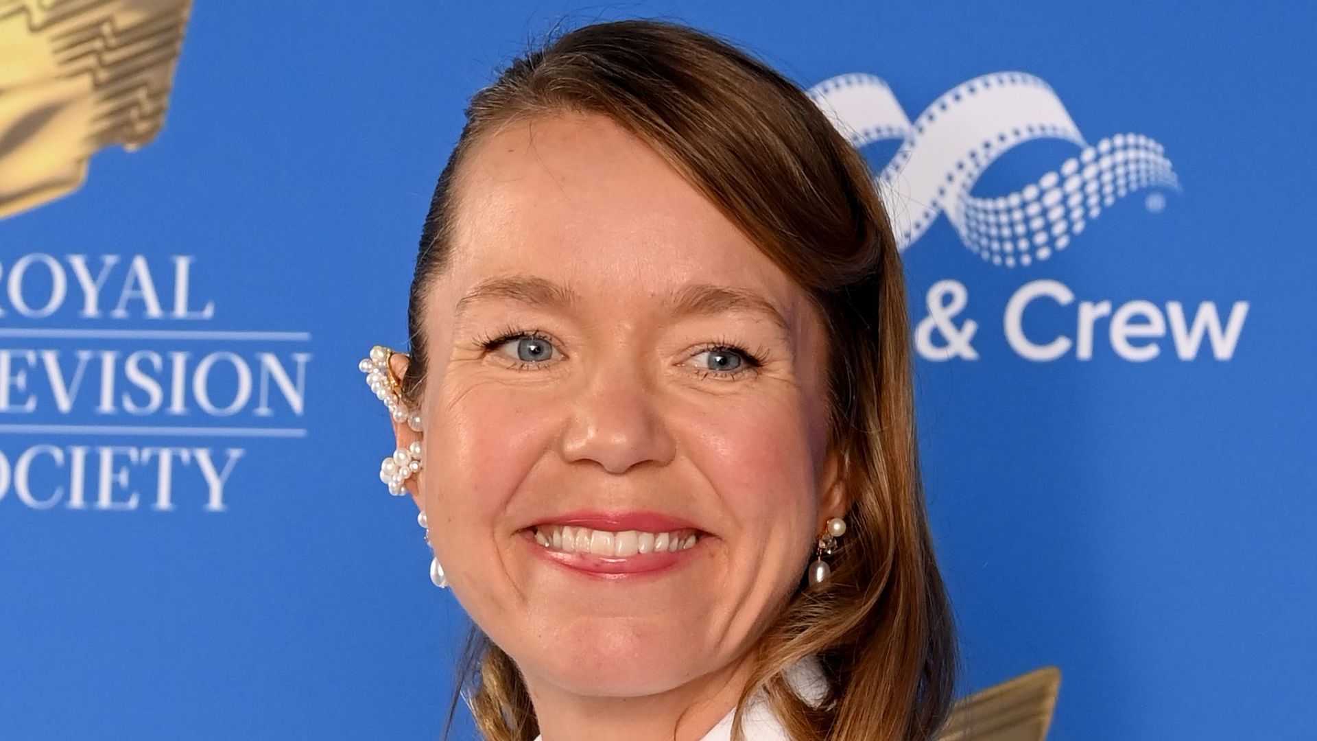 anna maxwell martin smiling in white dress 