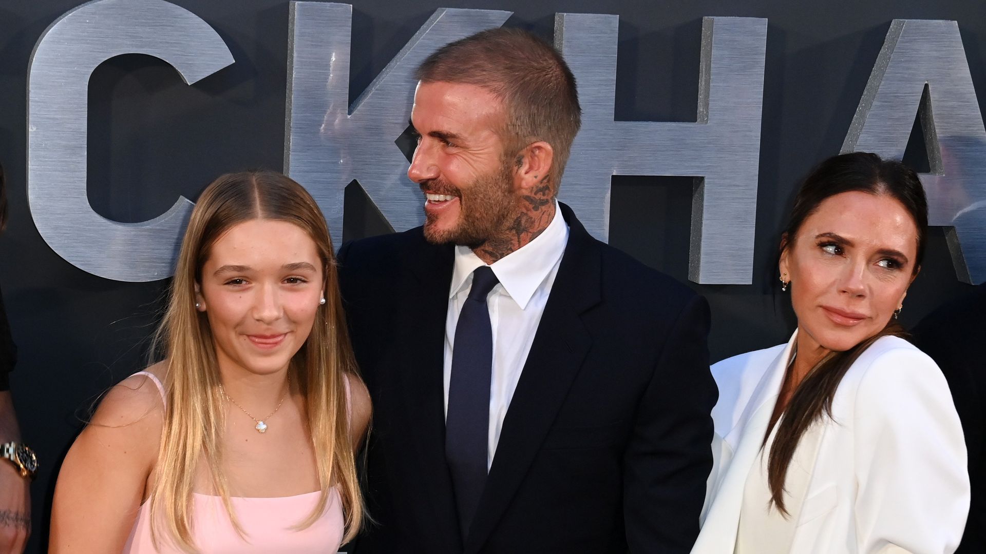 Harper Beckham with David and Victoria Beckham