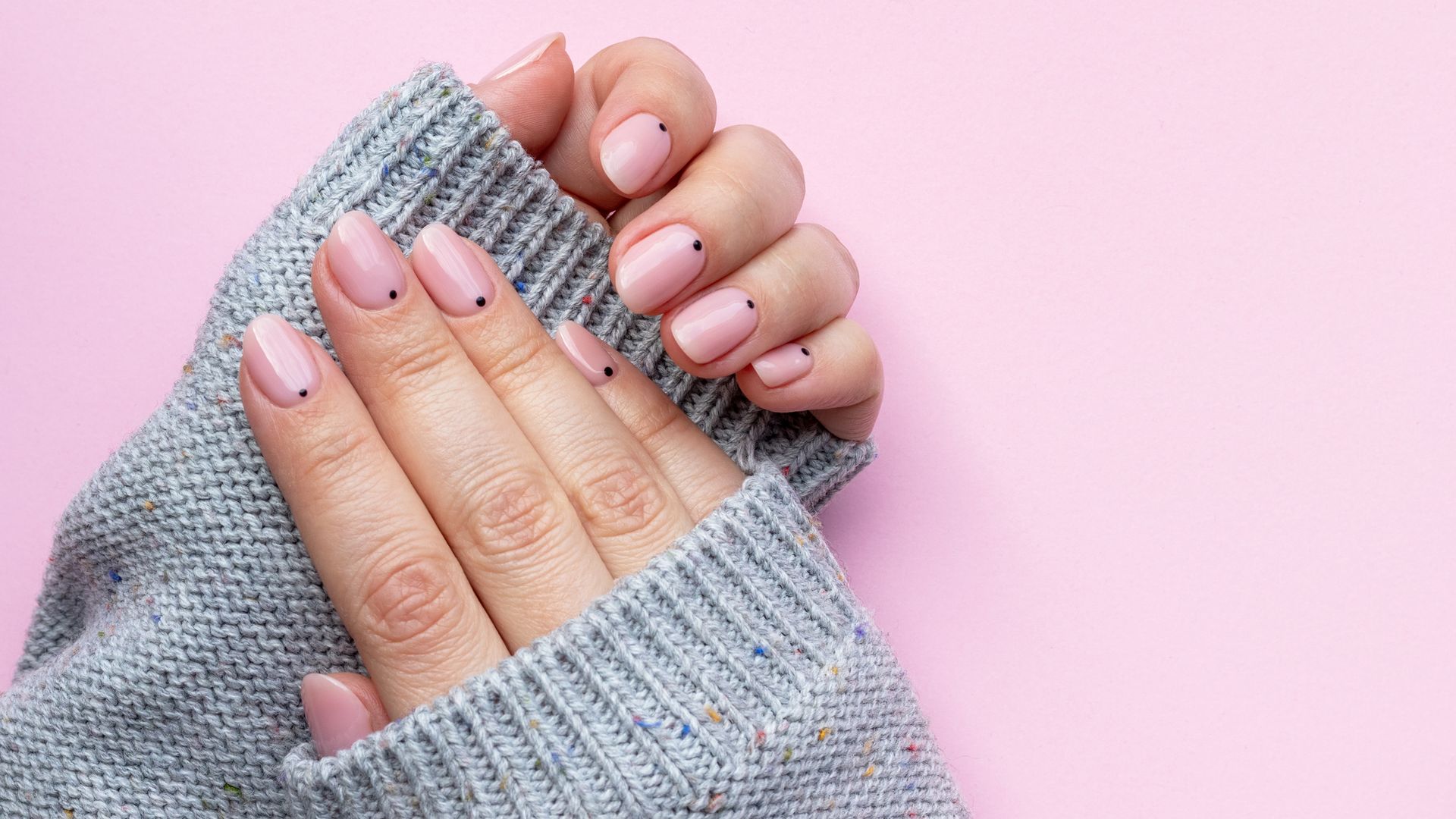 pink short nails manicure with dots