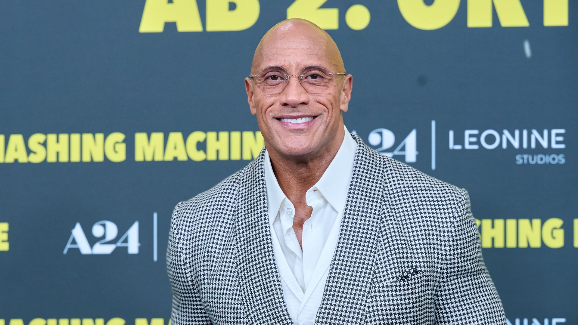 Dwayne Johnson in houndstooth blazer