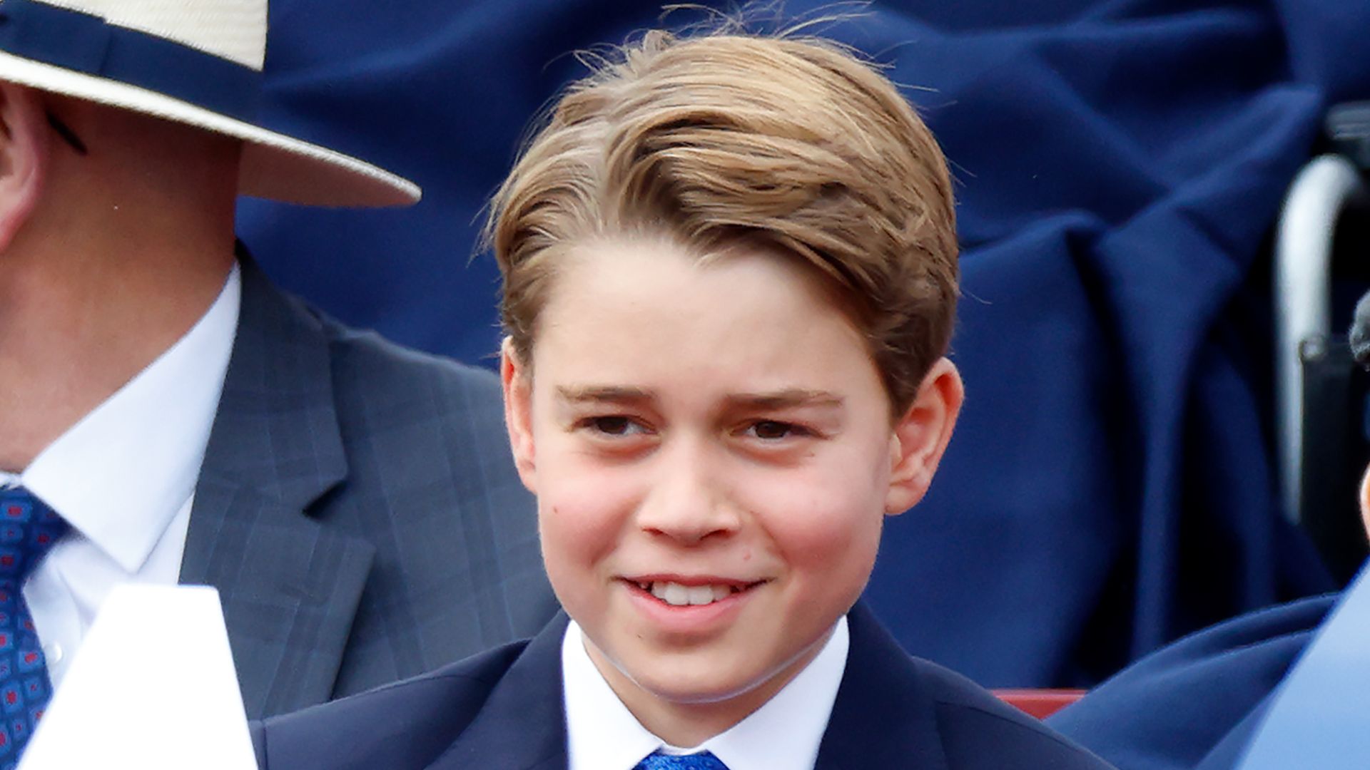 Prince George in a crowd of people