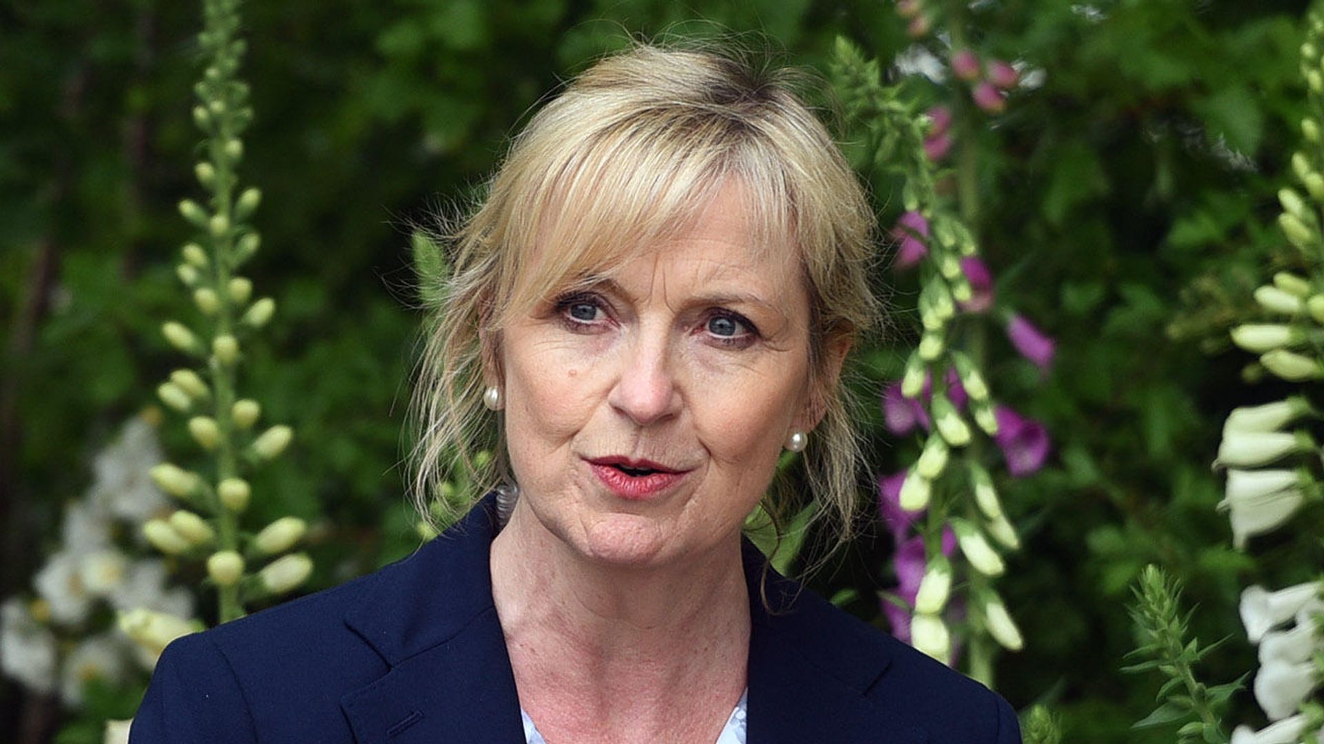 Carol Kirkwood with a stern expression in a blue coat