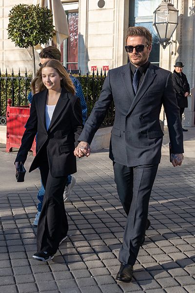 Victoria Beckham exudes Parisian chic alongside proud