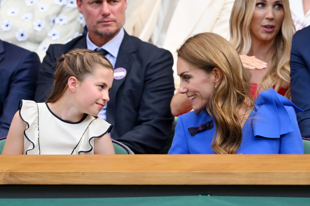 Princess Charlotte of Wales and Catherine, Princess of Wales attend day fourteen of the Wimbledon Tennis Championships at the All England Lawn Tennis and Croquet Club at All England Lawn Tennis and Croquet Club on July 13, 2025 in London, England