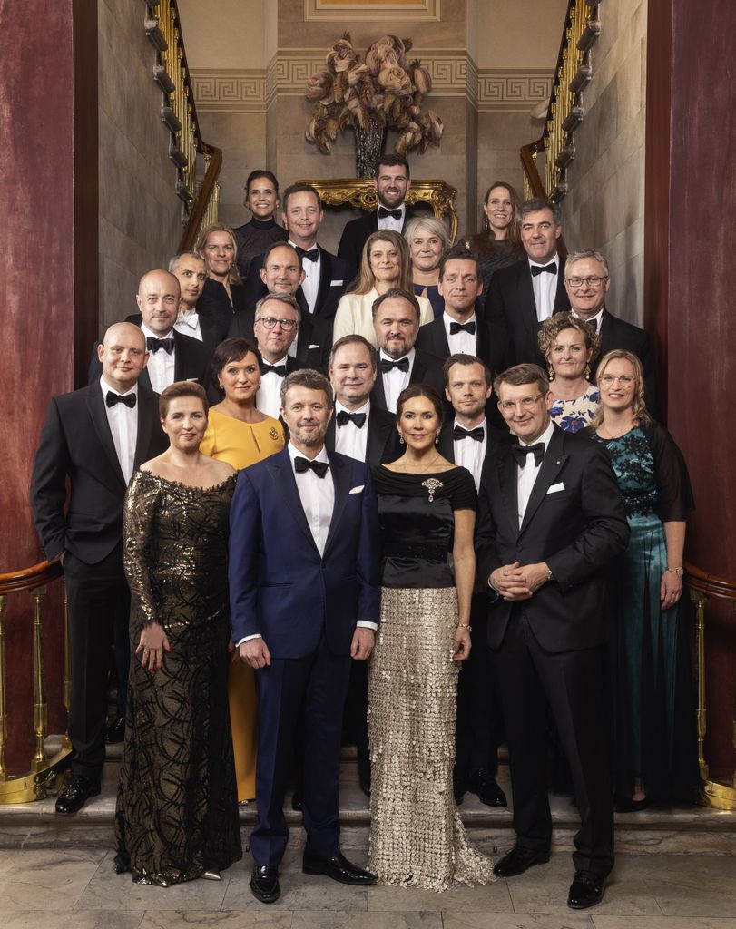 King Frederik and Queen Mary pose for a group photo with ministers
