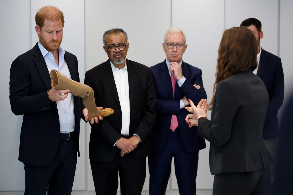 Harry examines a prosthetic limb
