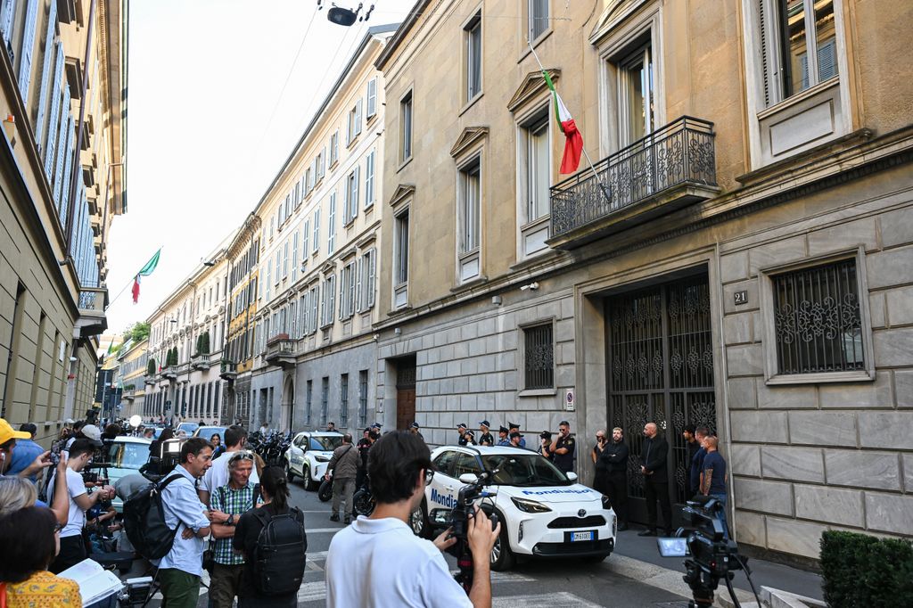 Members of the Media gather outside the headquarters of Italian Fashion House Giorgio Armani after the announcement of the death of it's founder Giorgio Armani, in Milan on September 4, 2025. Italian fashion great Giorgio Armani has died at the age of 91 "surrounded by his loved ones", his company announced on September 4, 2025