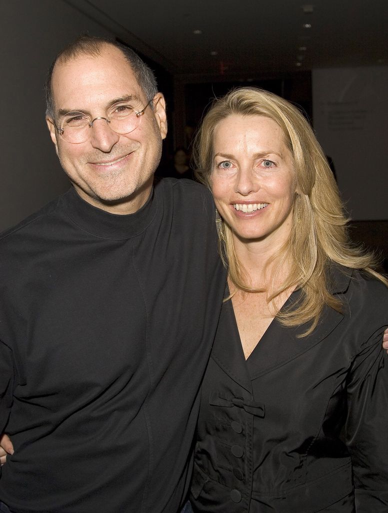 steve jobs and laurene powell jobs embracing
