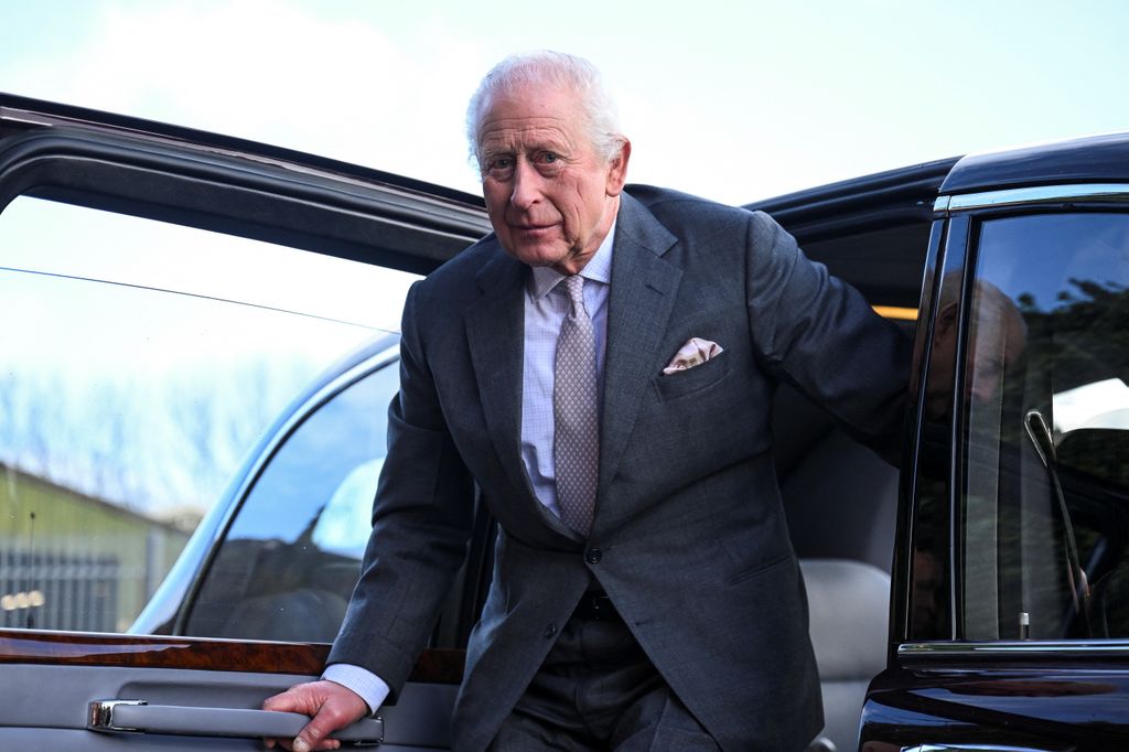 King Charles getting out of a car