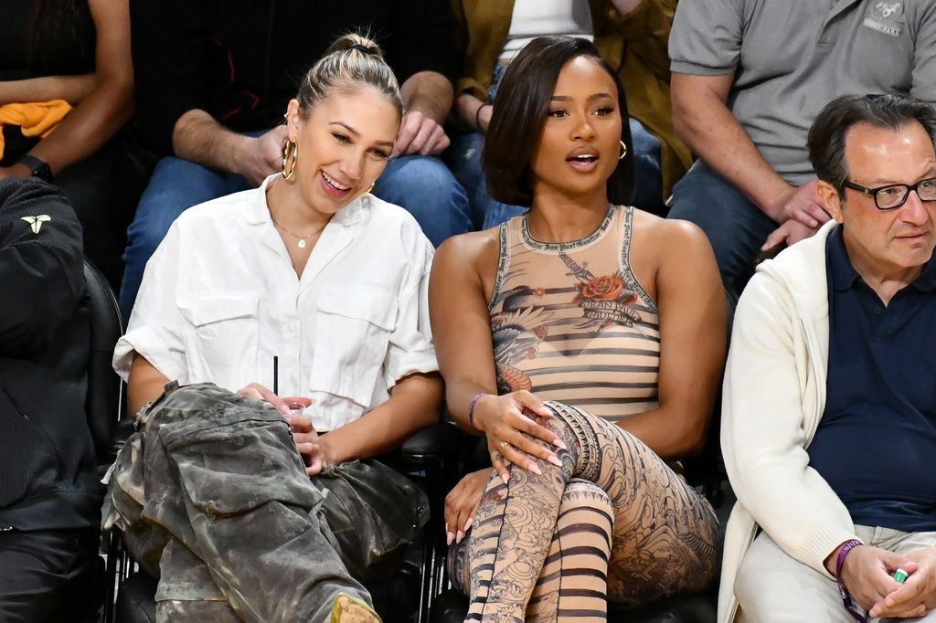 Kayla Nicole and a friend attend a Los Angeles Lakers and the Los Angeles Clippers game