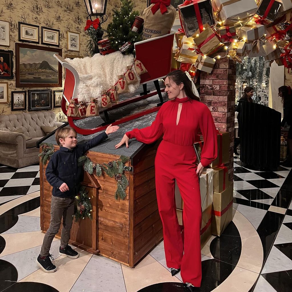 Holly Ramsay with her brother Oscar outside a festive display
