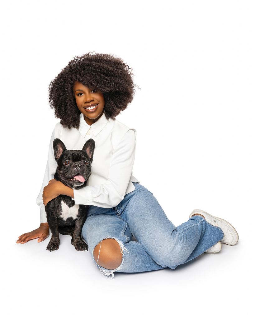 woman sat with French bulldog