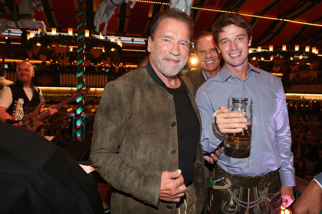 Arnold Schwarzenegger, Daniel Marshall and Patrick Schwarzenegger during the 187th Oktoberfest at Marstall tent