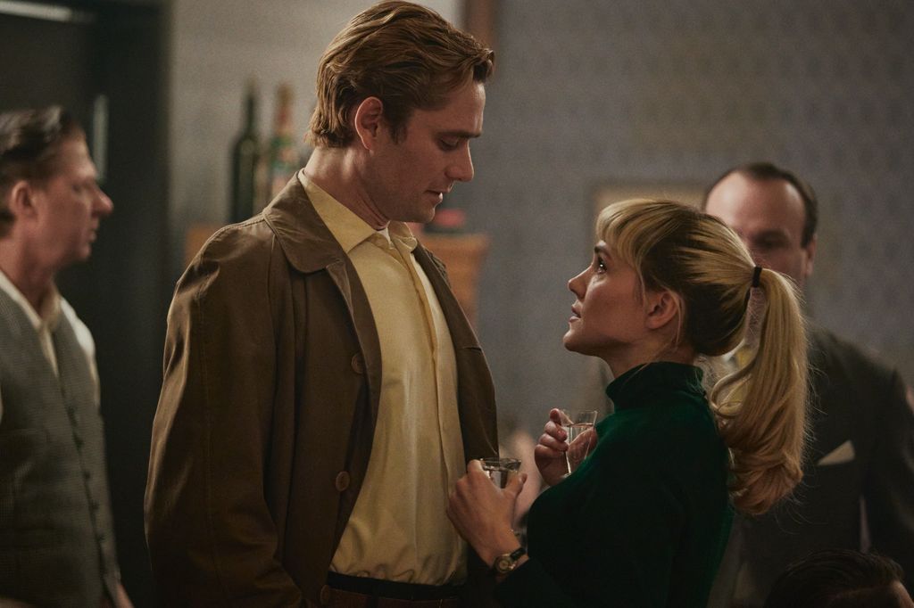 man and woman looking at each other