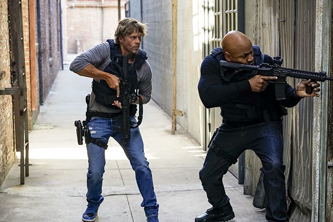 Eric Christian Olsen and LL Cool J aim at suspect on NCIS LA