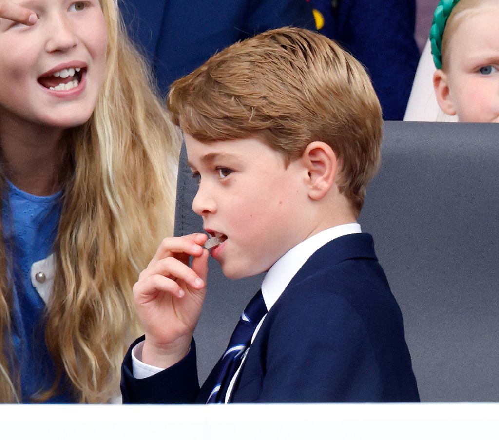 Prince George eating a Cola bottle
