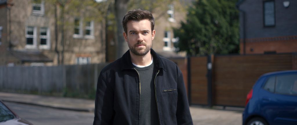 man standing in street