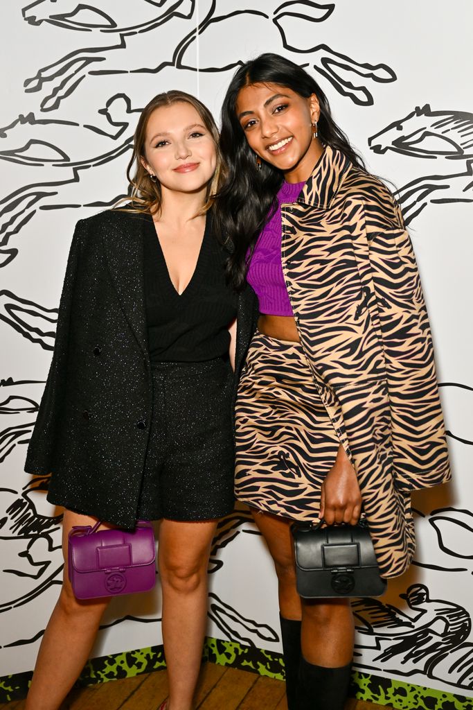 LONDON, ENGLAND - FEBRUARY 22: Mia McKenna-Bruce and Charithra Chandran attend the Longchamp University cocktail party at Goodenough College on February 22, 2024 in London, England. (Photo by Dave Benett/Getty Images for Longchamp UK)