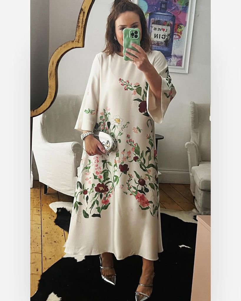 Jess wore a long sleeve voluminous dress to a wedding - so chic!
