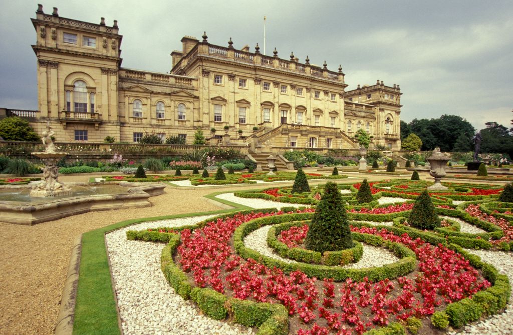 England, Yorkshire, Harewood House, Home Of Queens Cousin. A grand house with trimmed hedges shown 