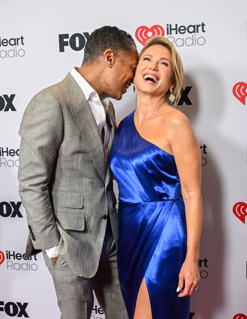 T. J. Holmes, Amy Robach at the 2025 iHeartRadio Music Awards held at the Dolby Theatre on March 17, 2025 in Los Angeles, California