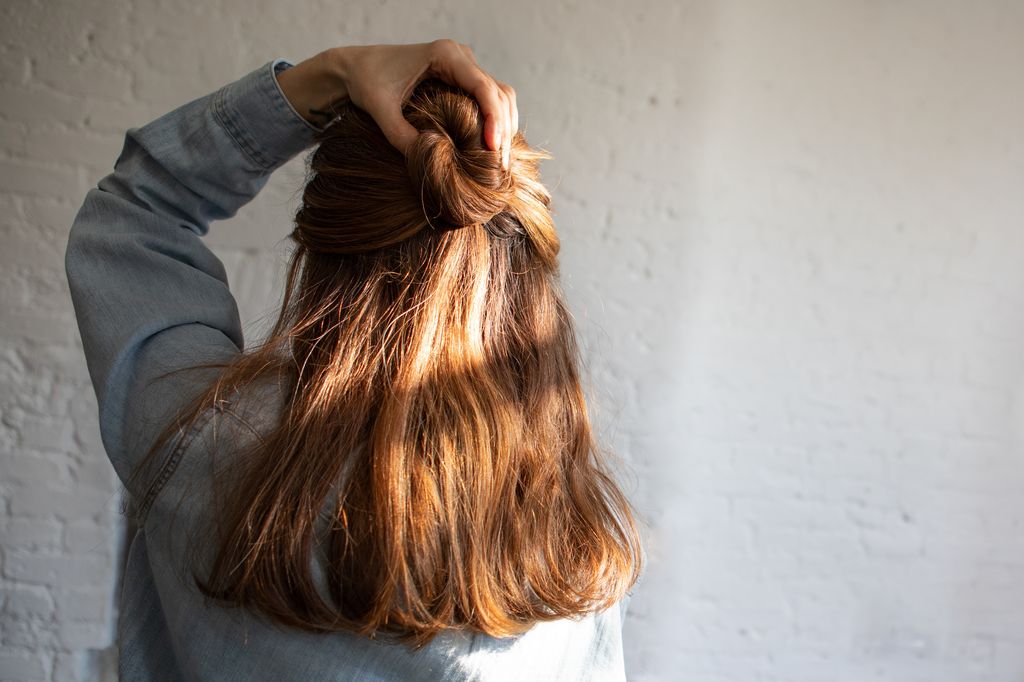 Half-up, half-down twisted knot