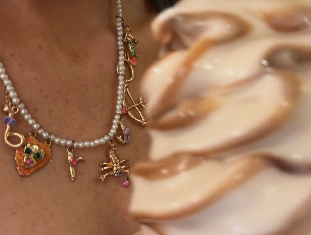 Blake Lively shows off her chain featuring charms for each of her children while eating ice cream at Disney World, shared on Instagram