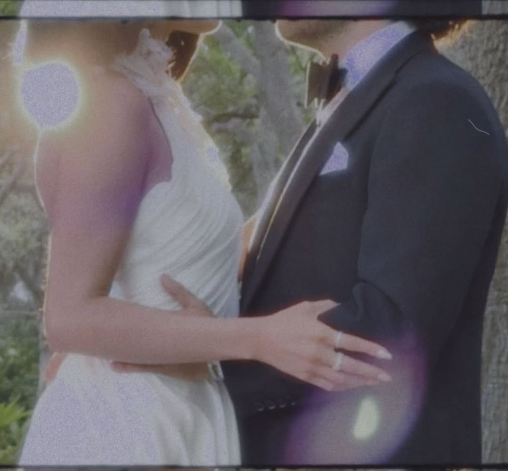 Selena and Benny's sweet embrace