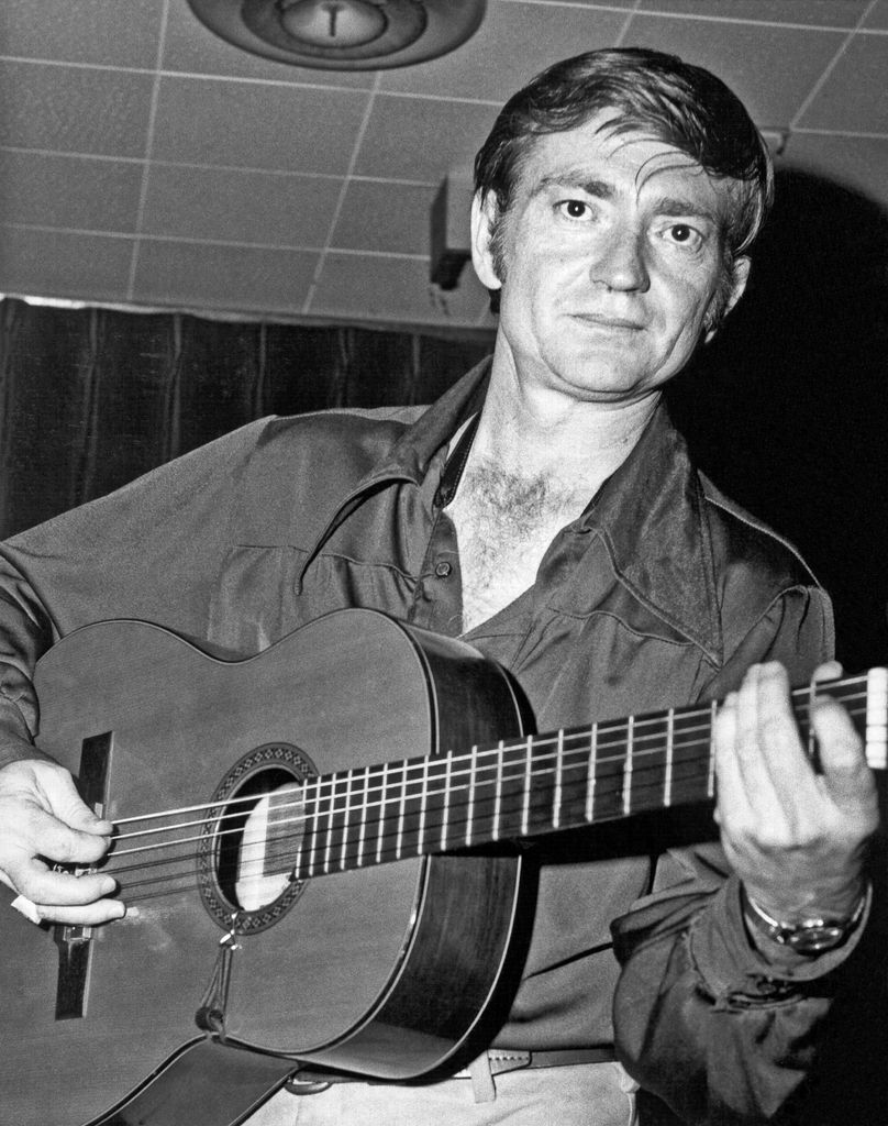 Willie looked a lot different  short hair, playing guitar clean cut 