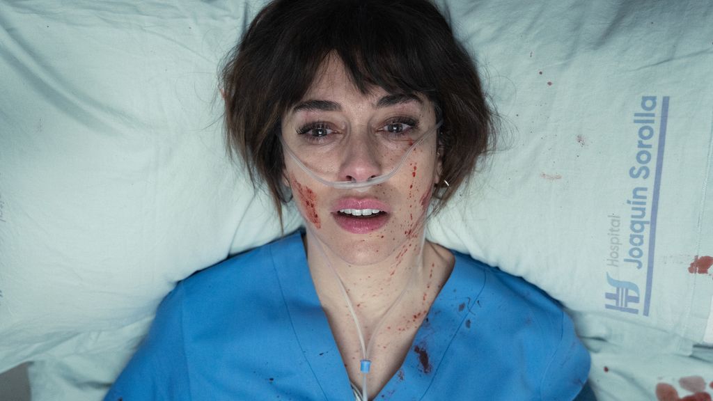 nurse lying in hospital bed